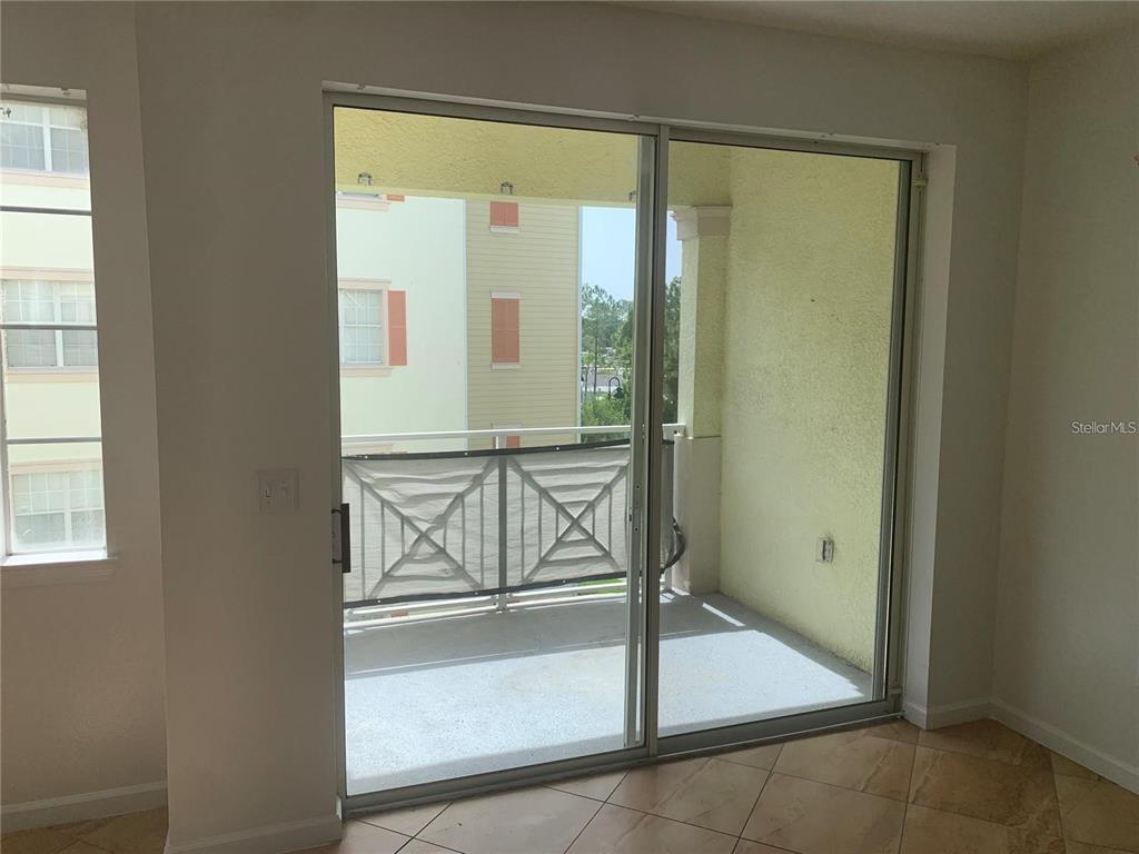5255 Cane Island Loop, Unit 304 Kissimmee, FL 34746 - Photo 9 of 14 a view of entryway