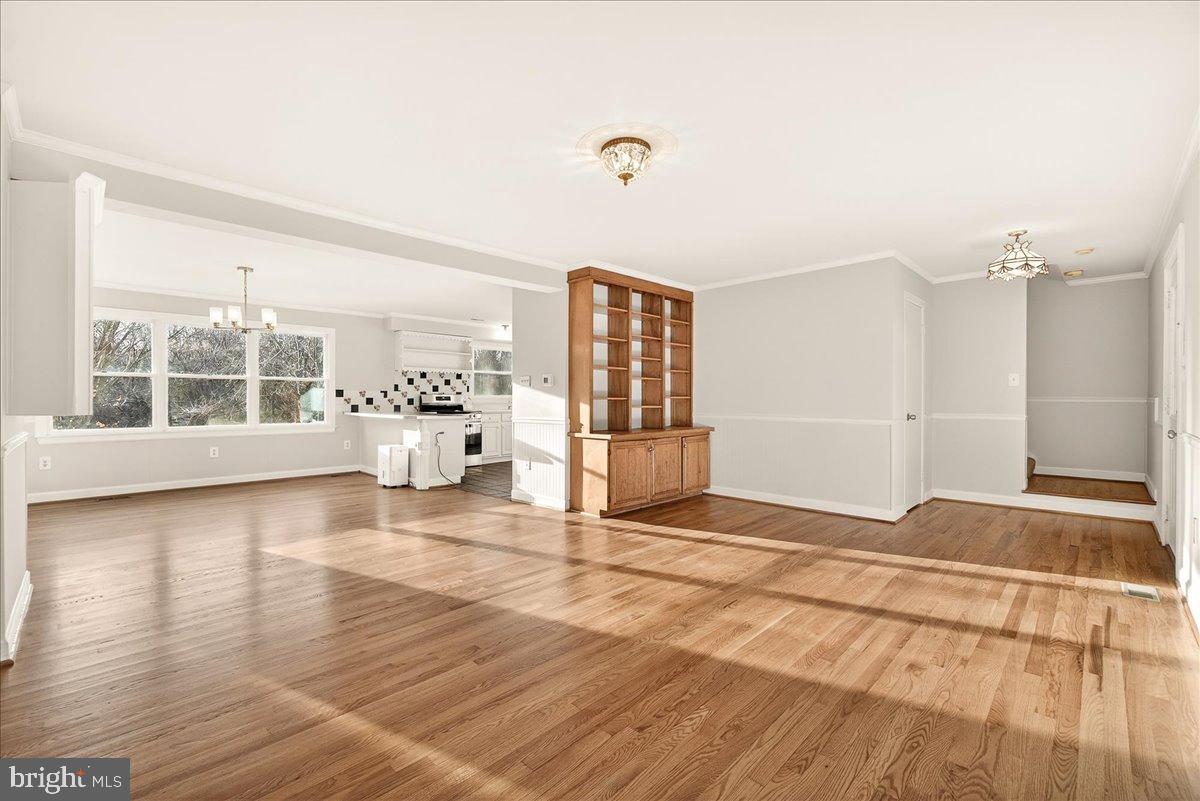 6918 Woodville Road Mount Airy, MD 21771 - Photo 11 of 46 Spacious, sunlit living area with charm.