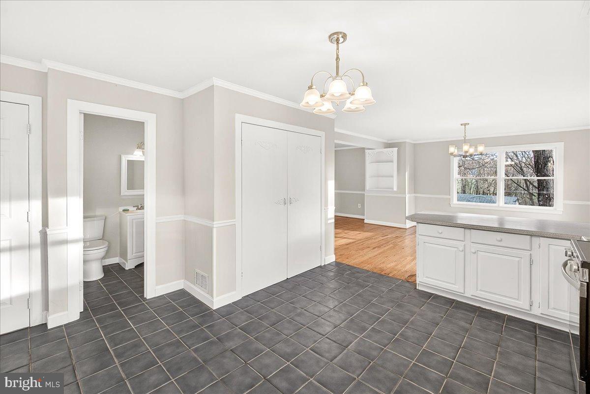 6918 Woodville Road Mount Airy, MD 21771 - Photo 17 of 46 Spacious kitchen with modern finishes.