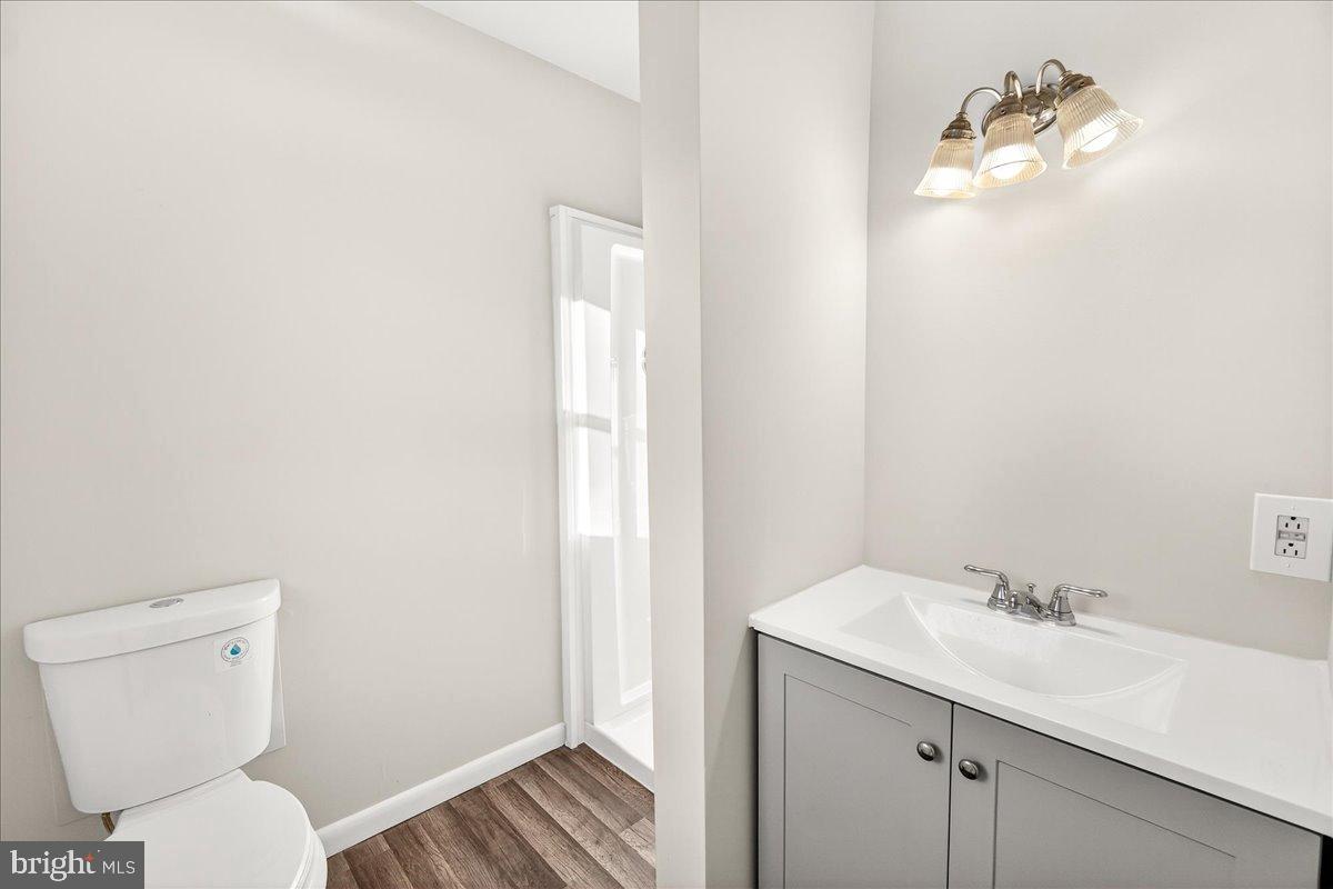 6918 Woodville Road Mount Airy, MD 21771 - Photo 25 of 46 Modern bathroom with sleek finishes.