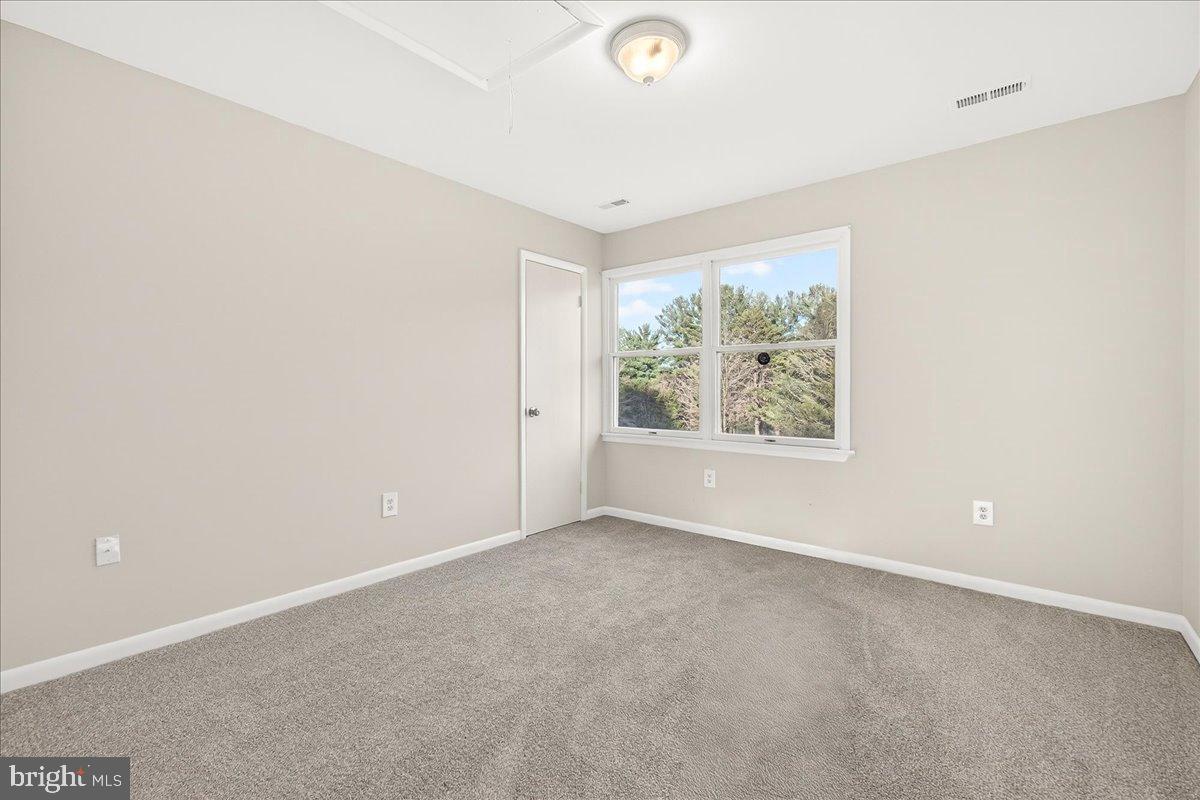 6918 Woodville Road Mount Airy, MD 21771 - Photo 28 of 46 Bright and airy room with scenic views.