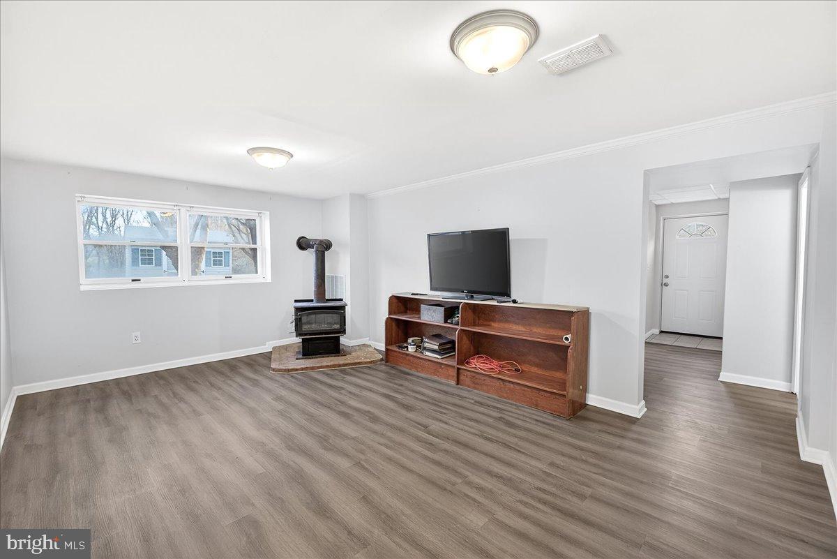 6918 Woodville Road Mount Airy, MD 21771 - Photo 29 of 46 Spacious, bright living area with modern charm.