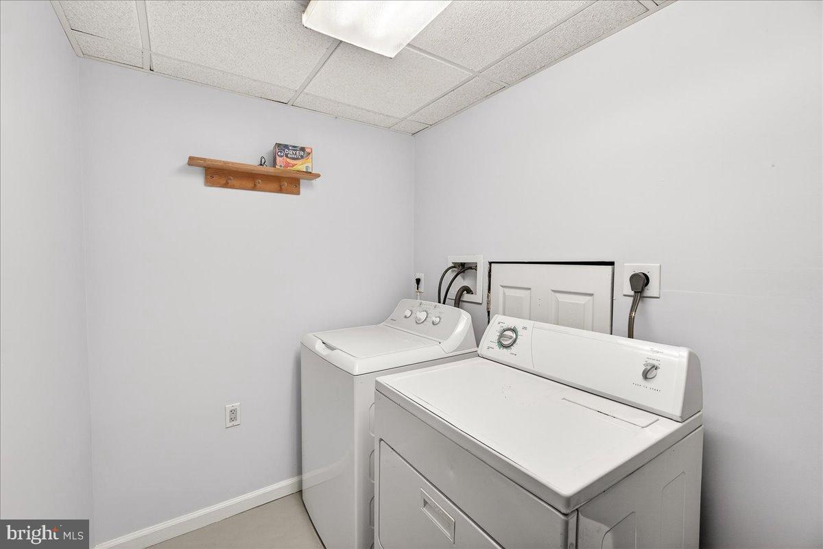 6918 Woodville Road Mount Airy, MD 21771 - Photo 36 of 46 Bright and functional laundry space.