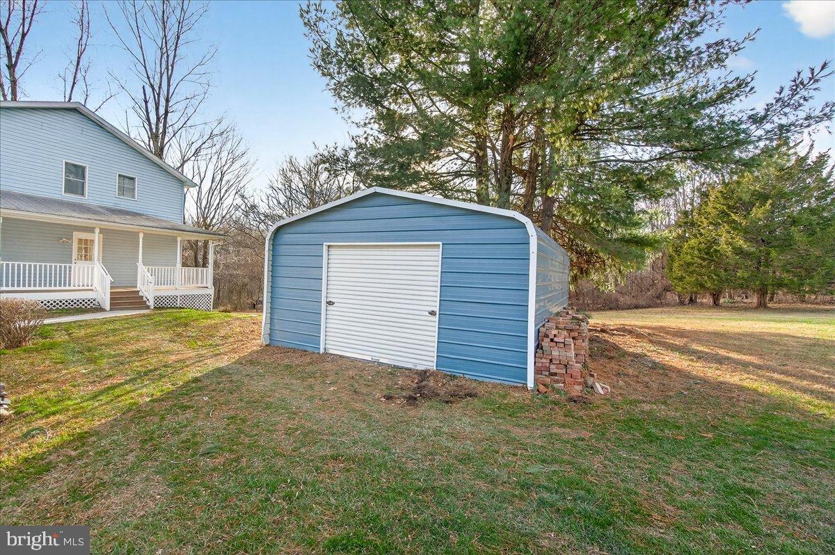 6918 Woodville Road Mount Airy, MD 21771 - Photo 45 of 46 Charming home with a spacious backyard shed.