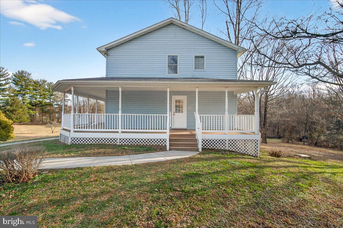 6918 Woodville Road Mount Airy, MD 21771 - Photo 5 of 46 Charming blue home with inviting porch.