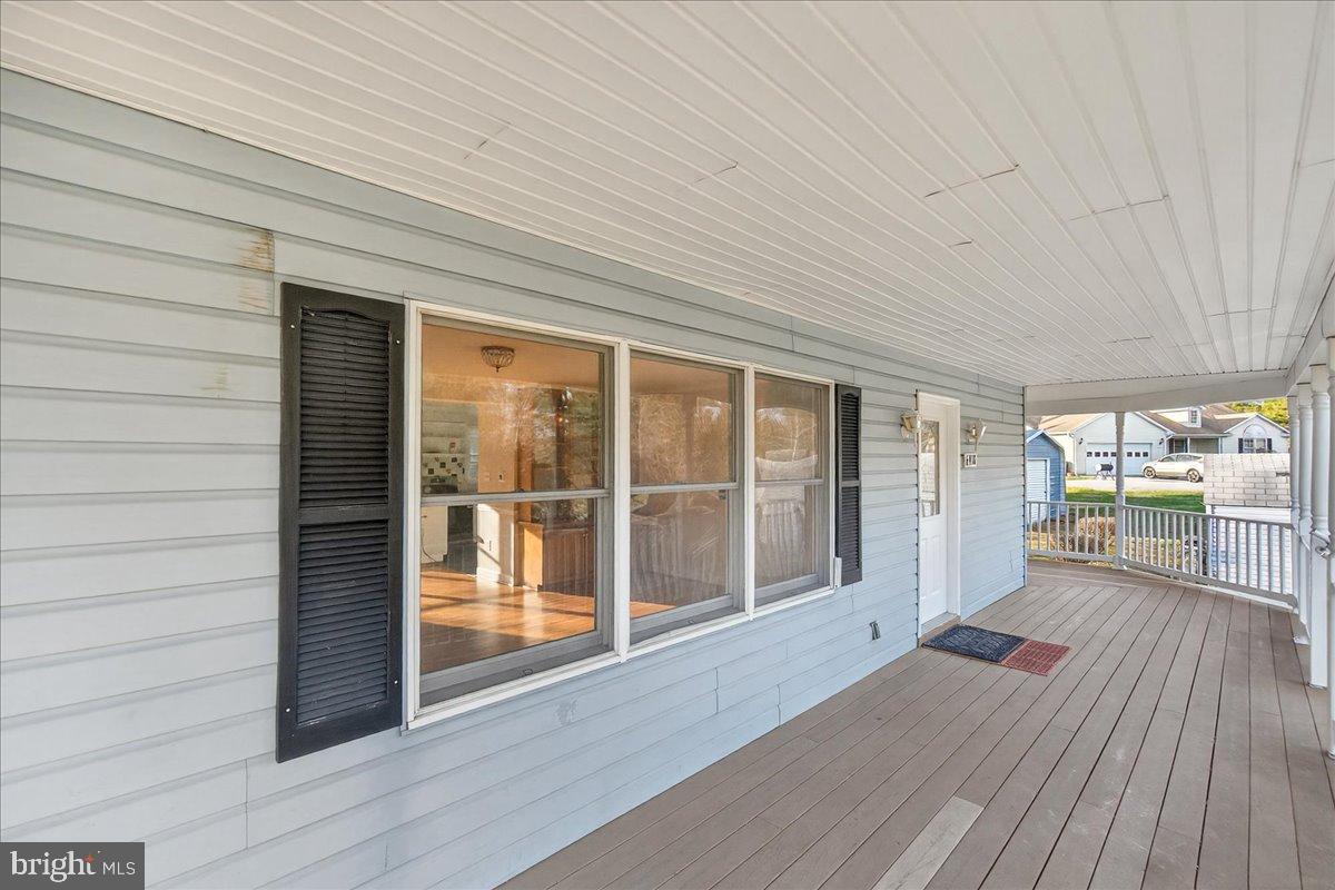 6918 Woodville Road Mount Airy, MD 21771 - Photo 6 of 46 Charming porch with inviting natural light.
