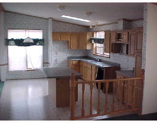 236 Stein Road Chicora, PA 16025 - Photo 4 of 6 Kitchen. 18X14-WITH AN ISLAND-LOTS OF WORK SPACE & NICE VIEW OF THE WOODS*LOTS OF CUPBOARD SPACE
