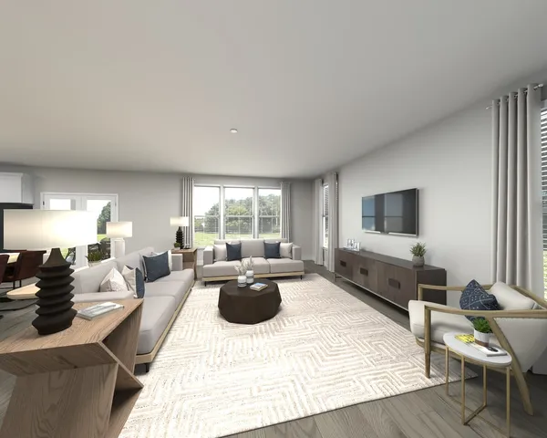 a living room with furniture wooden floor and a large window