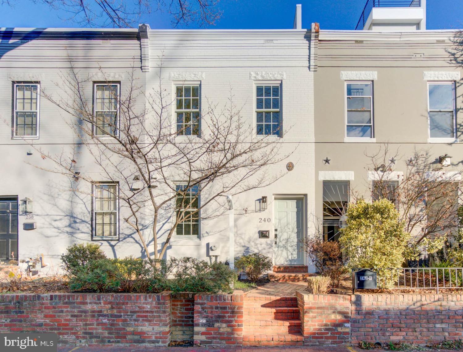 a front view of a building with street view
