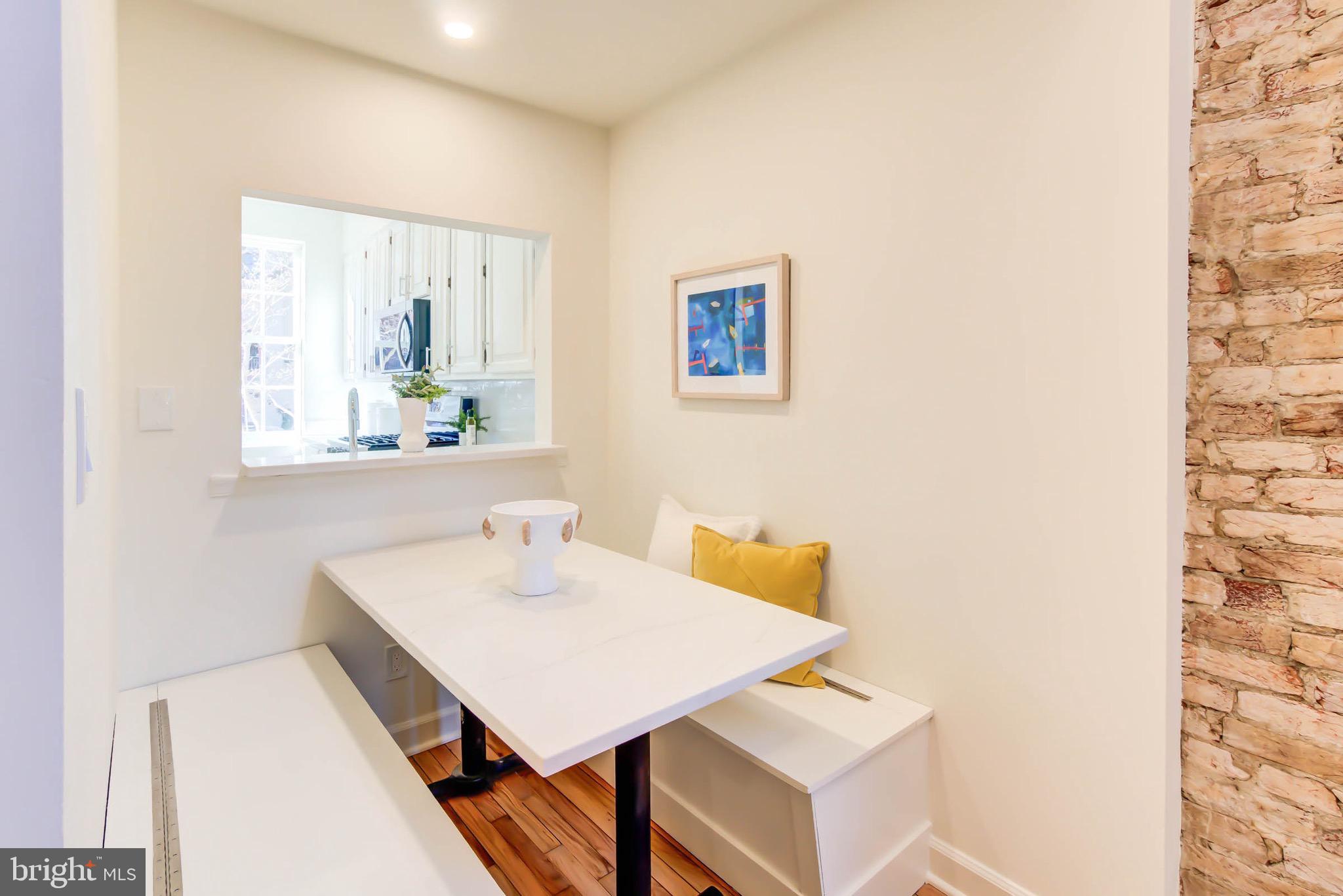 240 14th Street Southeast Washington, DC 20003 - Photo 5 of 14 a view of a workspace with furniture