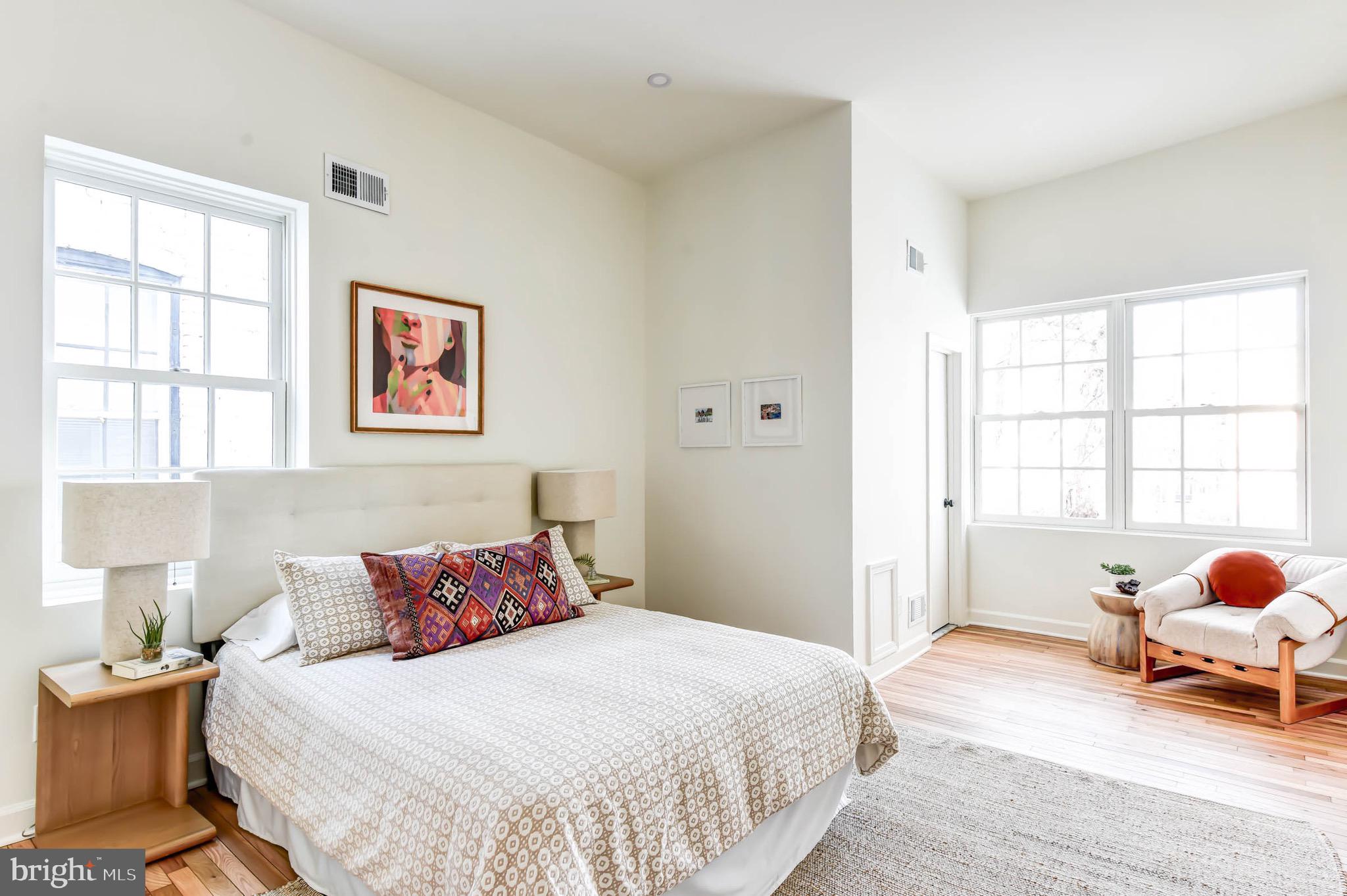 240 14th Street Southeast Washington, DC 20003 - Photo 7 of 14 a bedroom with a bed and a window