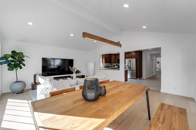 a swimming pool with wooden fence