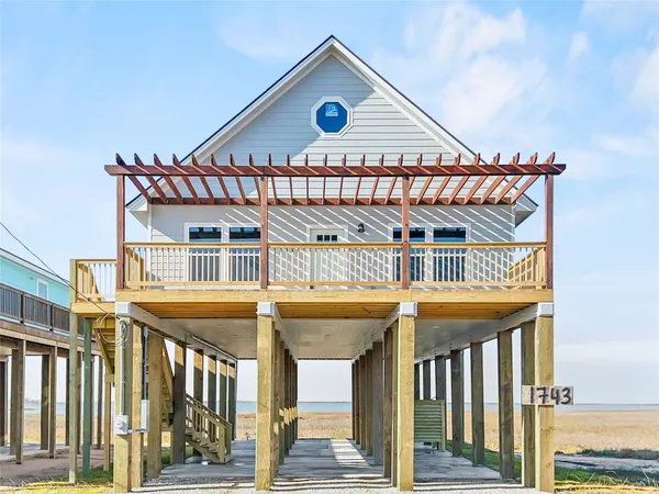 a front view of a house with a porch