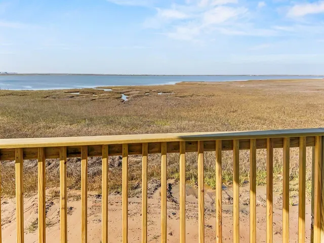 a view of swimming pool from a balcony