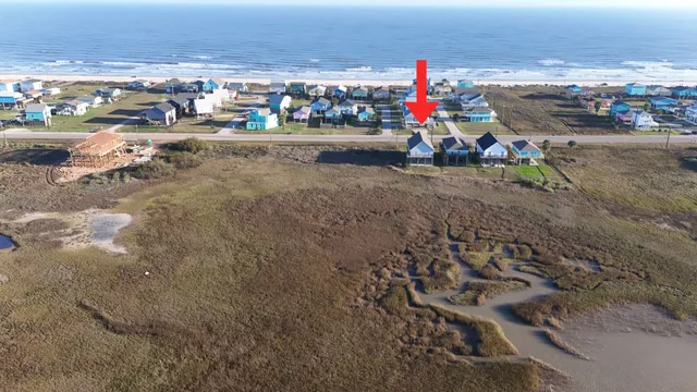 a room with water heater and wooden floor