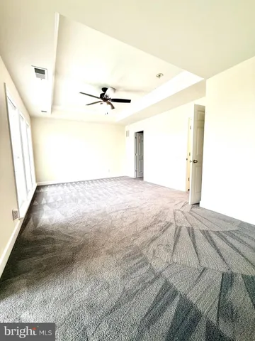 a view of a big room with wooden floor