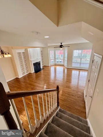 a view of a living room and workspace