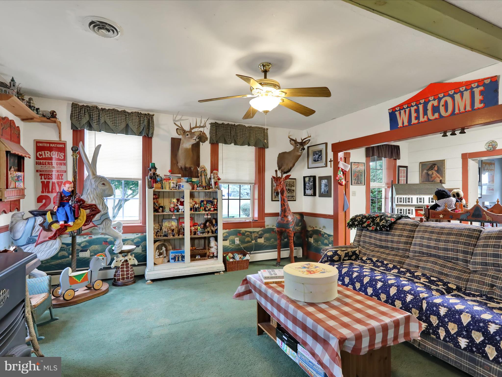 1443 Shumaker Road Manheim, PA 17545 - Photo 15 of 71 a room with lots of furniture and baby crib