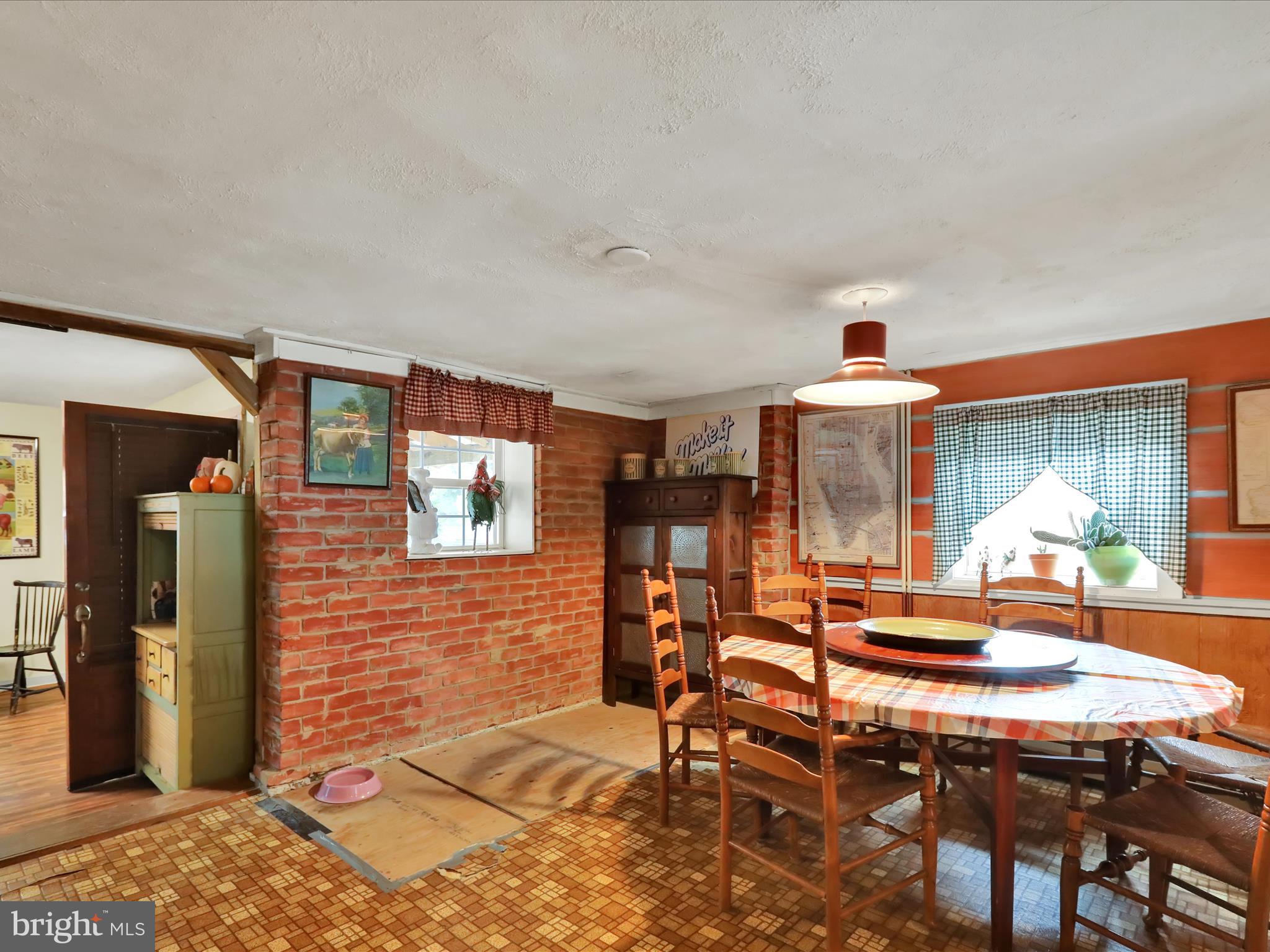 1443 Shumaker Road Manheim, PA 17545 - Photo 22 of 71 a patio with patio a table and chairs and potted plants