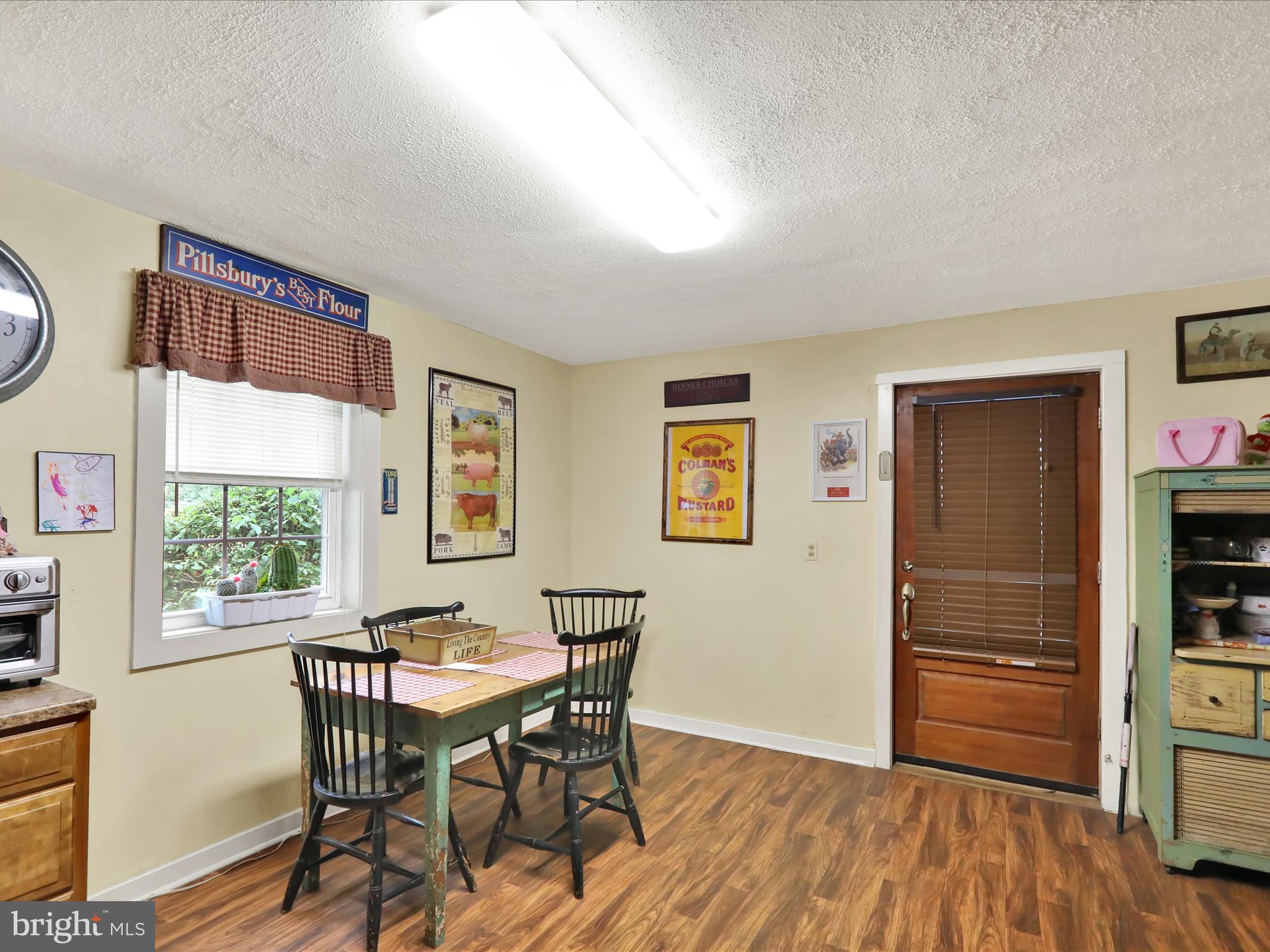1443 Shumaker Road Manheim, PA 17545 - Photo 26 of 71 a view of a dining room with furniture and a window