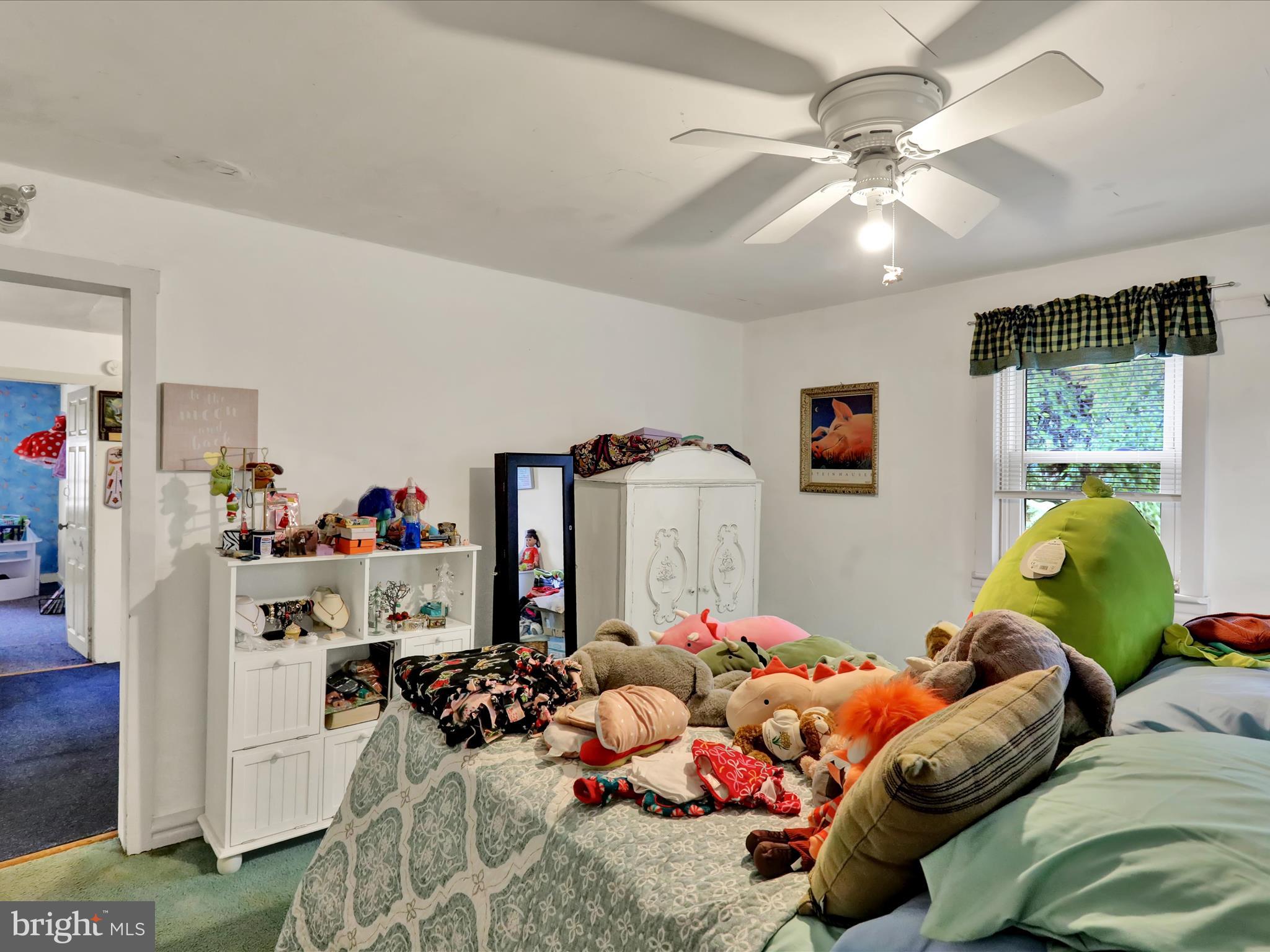 1443 Shumaker Road Manheim, PA 17545 - Photo 33 of 71 a bedroom with furniture and a large window