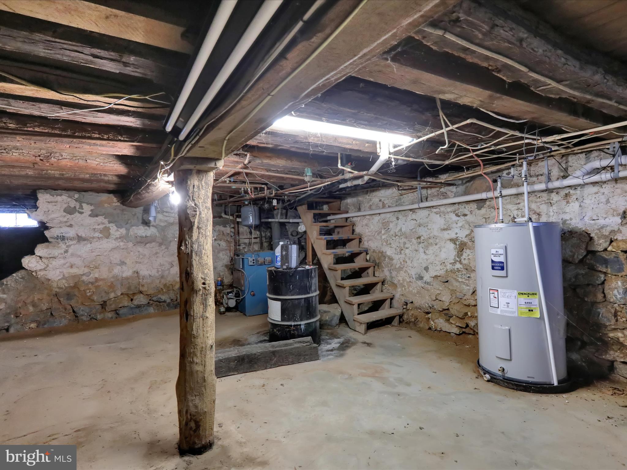 1443 Shumaker Road Manheim, PA 17545 - Photo 39 of 71 a view of water heater room with stairs