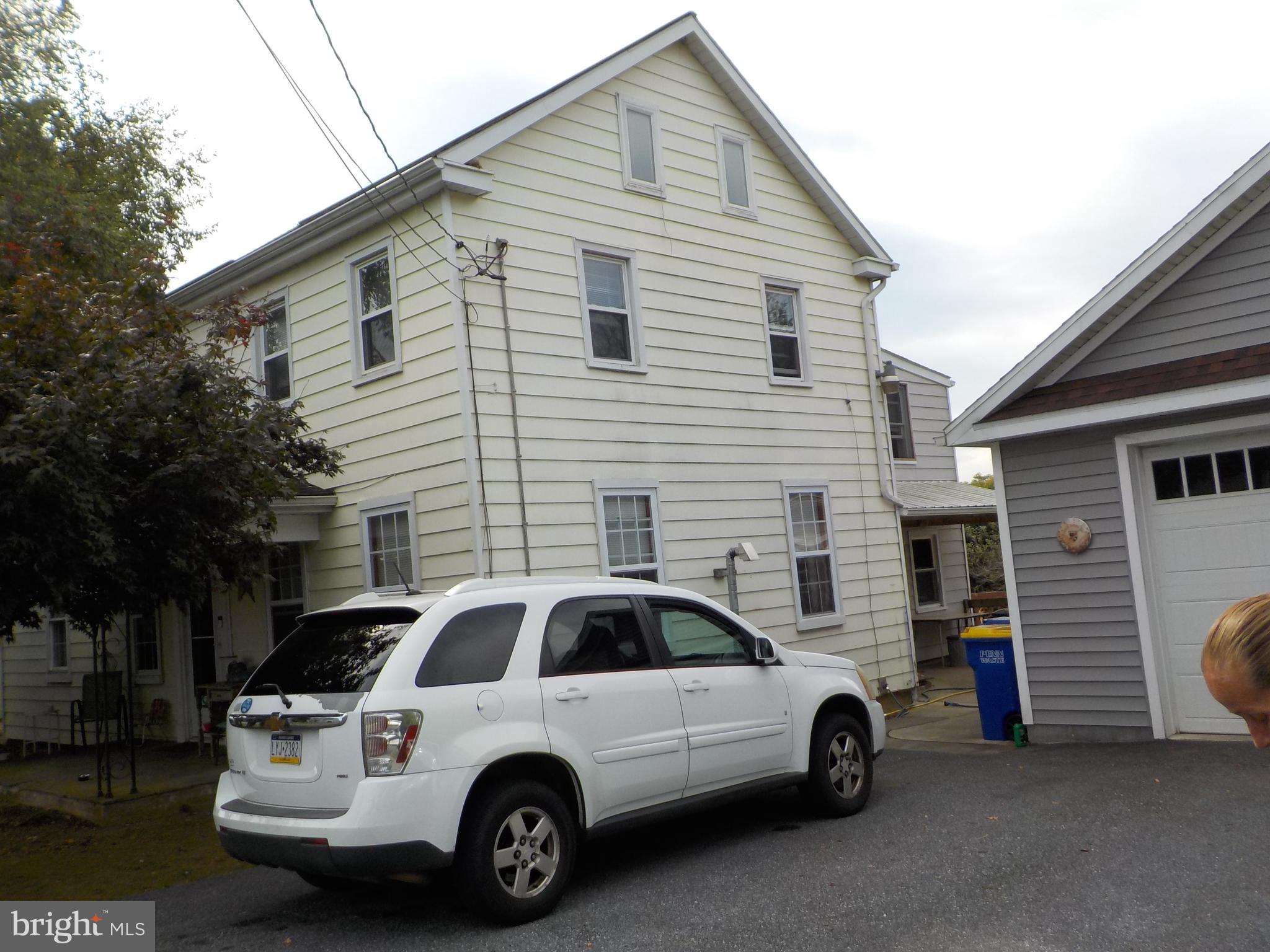 1443 Shumaker Road Manheim, PA 17545 - Photo 4 of 71 a view of a car parked in front of a house