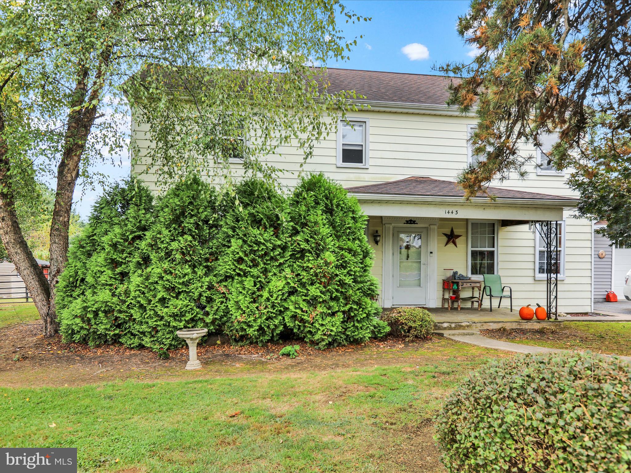 1443 Shumaker Road Manheim, PA 17545 - Photo 45 of 71 a front view of a house with garden
