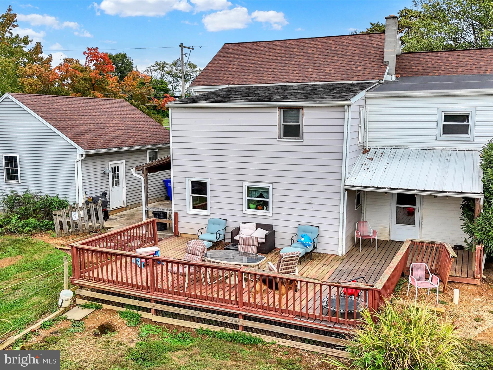 1443 Shumaker Road Manheim, PA 17545 - Photo 63 of 71 a view of a house with wooden deck and furniture