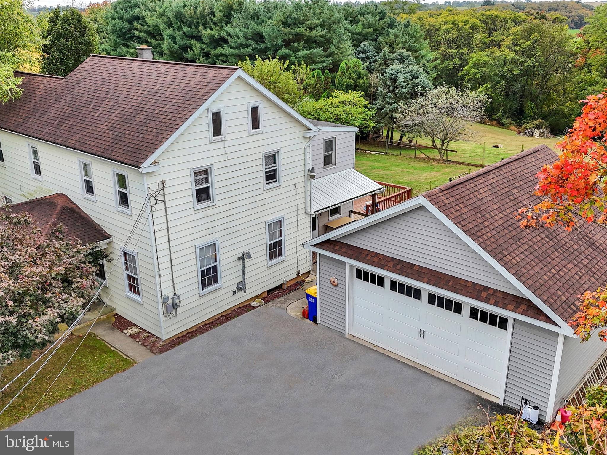 1443 Shumaker Road Manheim, PA 17545 - Photo 71 of 71 a view of a house with a yard and deck area