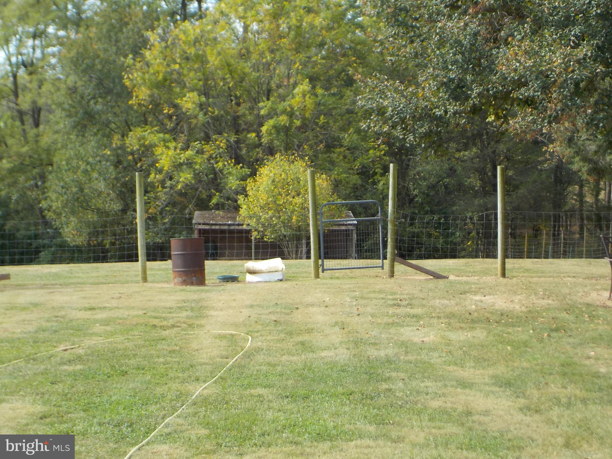 1443 Shumaker Road Manheim, PA 17545 - Photo 9 of 71 a house with trees in the background