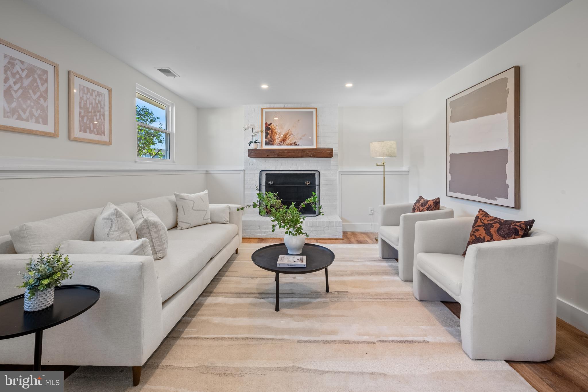 1359 Rock Chapel Road Herndon, VA 20170 - Photo 1 of 36 a living room with furniture and a fireplace