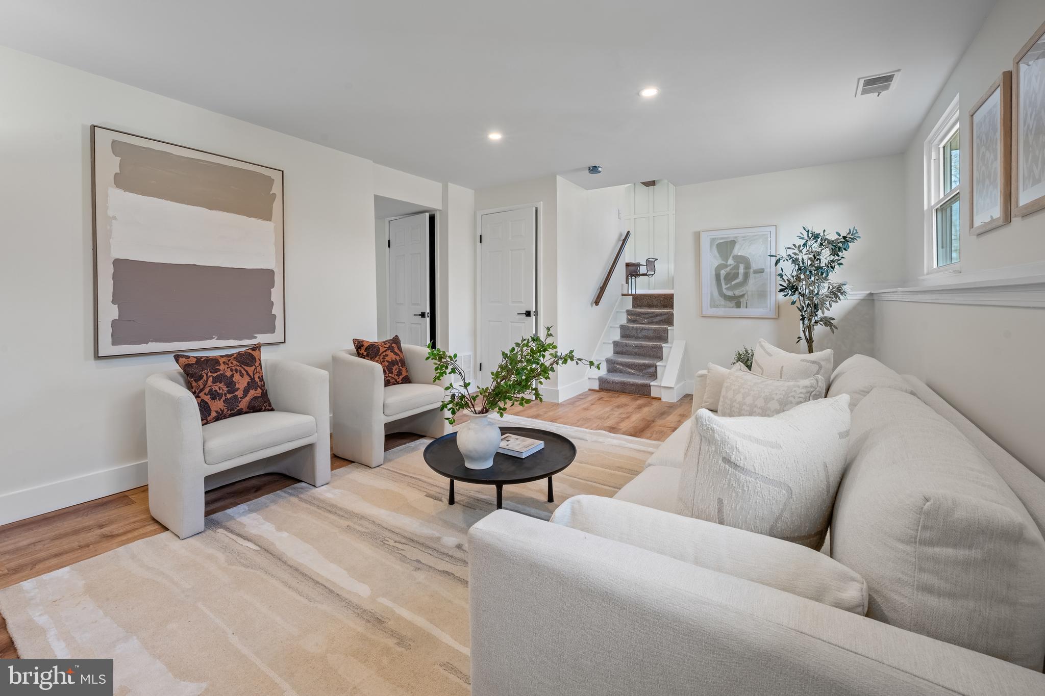 1359 Rock Chapel Road Herndon, VA 20170 - Photo 18 of 36 a living room with furniture and a potted plant