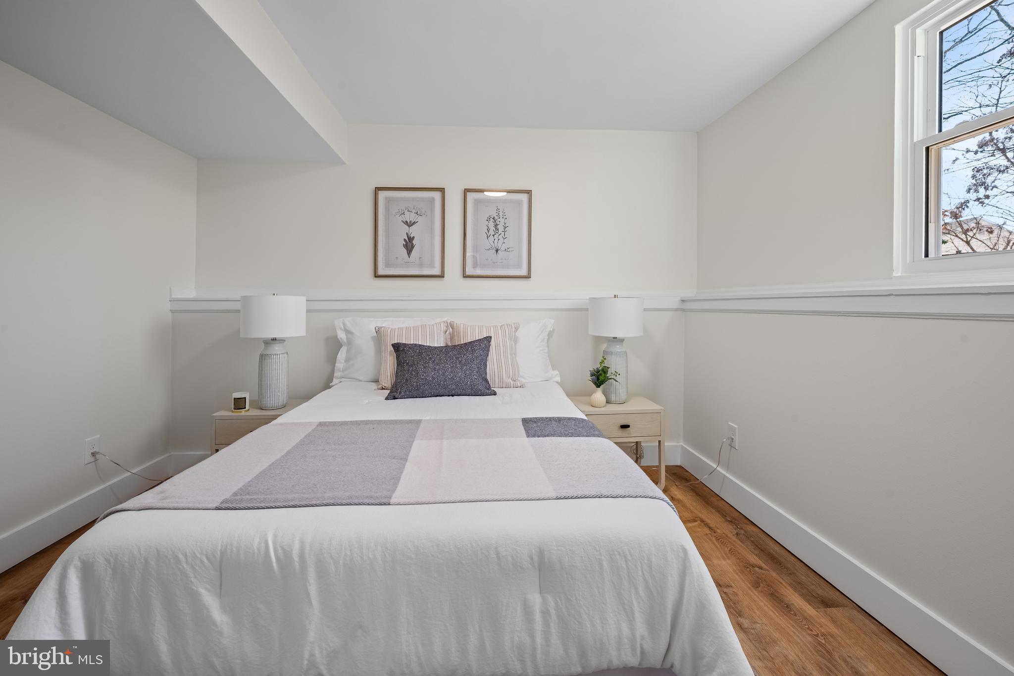 1359 Rock Chapel Road Herndon, VA 20170 - Photo 21 of 36 a bedroom with a bed and a window