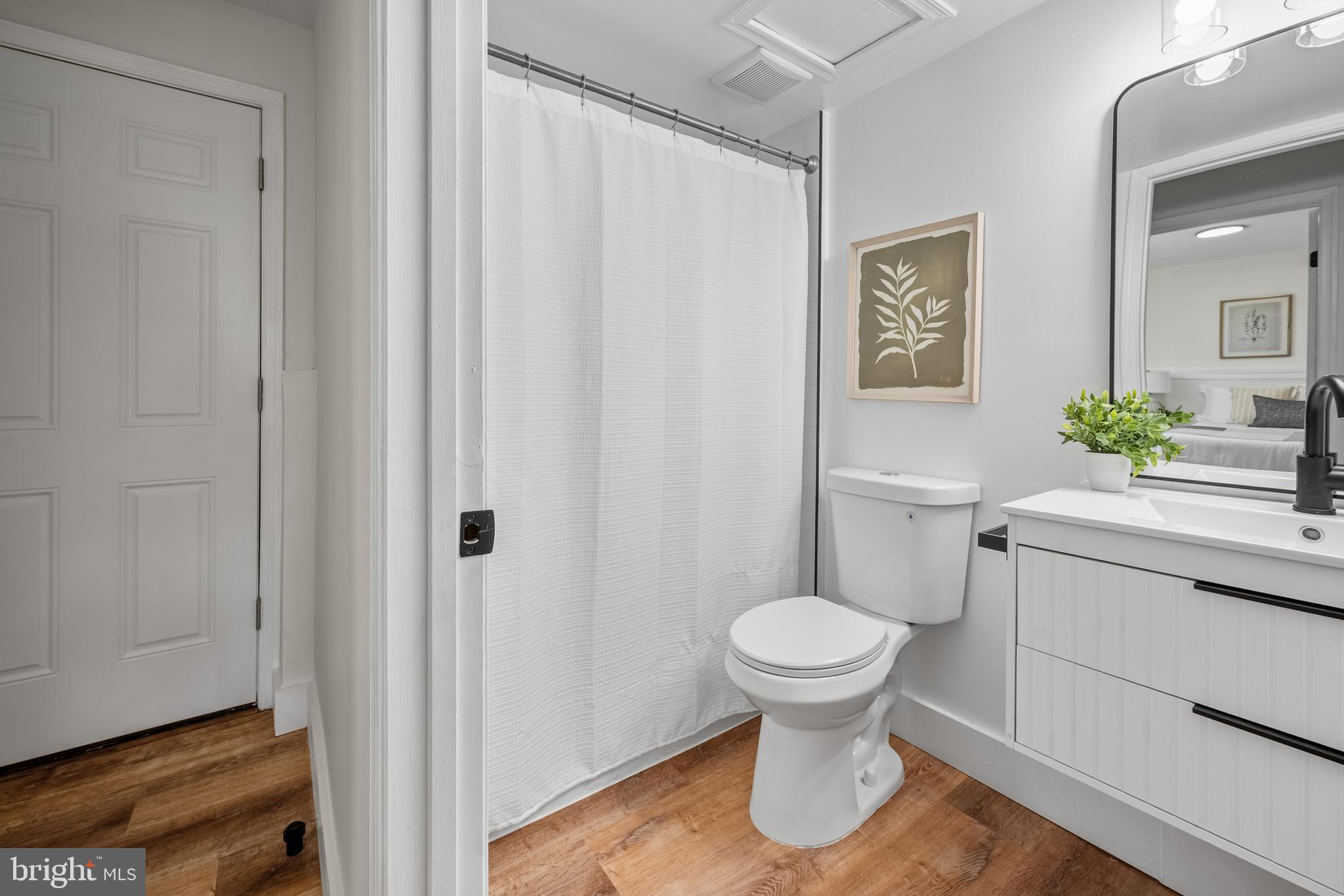 1359 Rock Chapel Road Herndon, VA 20170 - Photo 22 of 36 a bathroom with a toilet and a sink