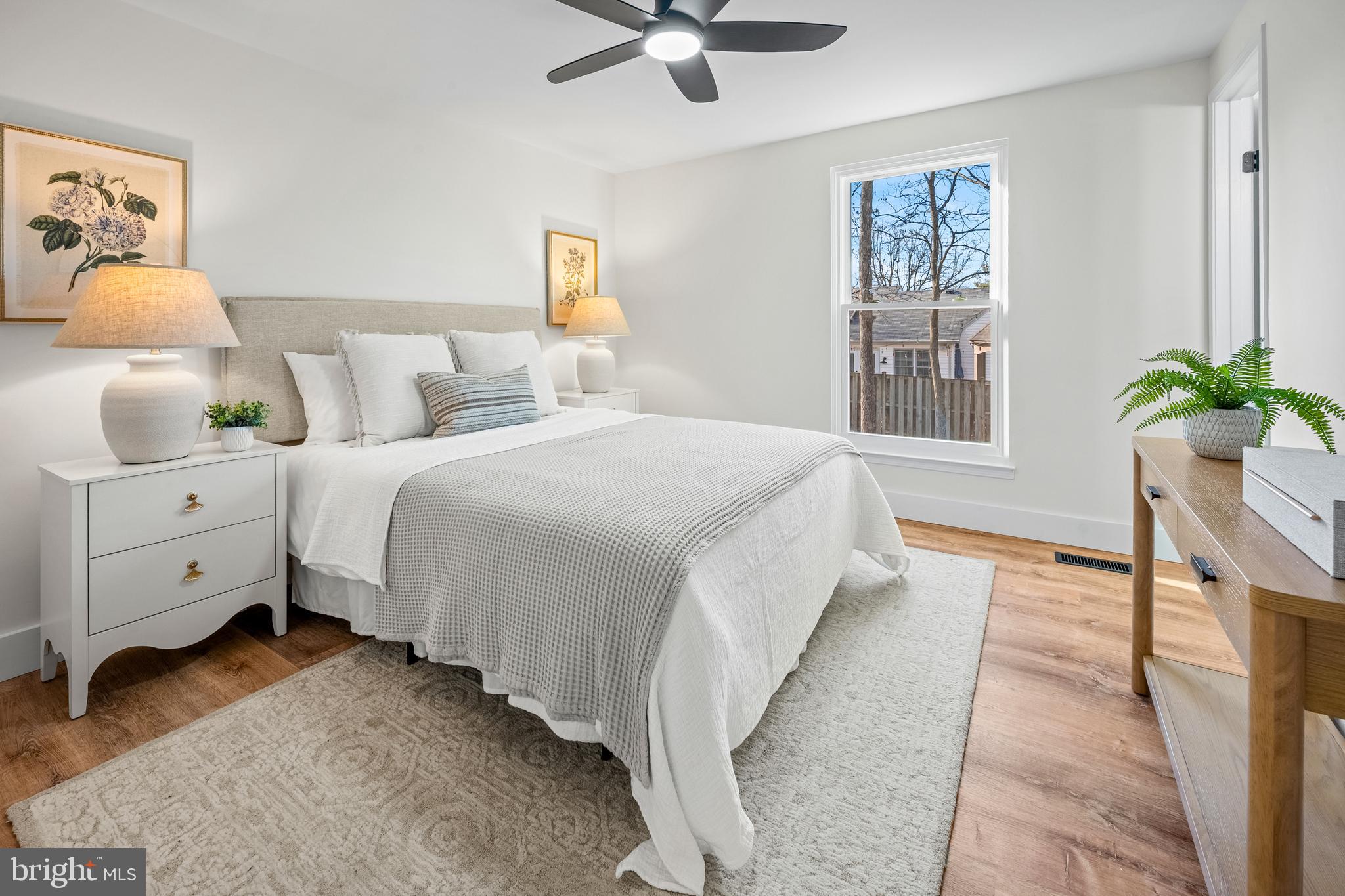 1359 Rock Chapel Road Herndon, VA 20170 - Photo 9 of 36 a spacious bedroom with a bed and a window