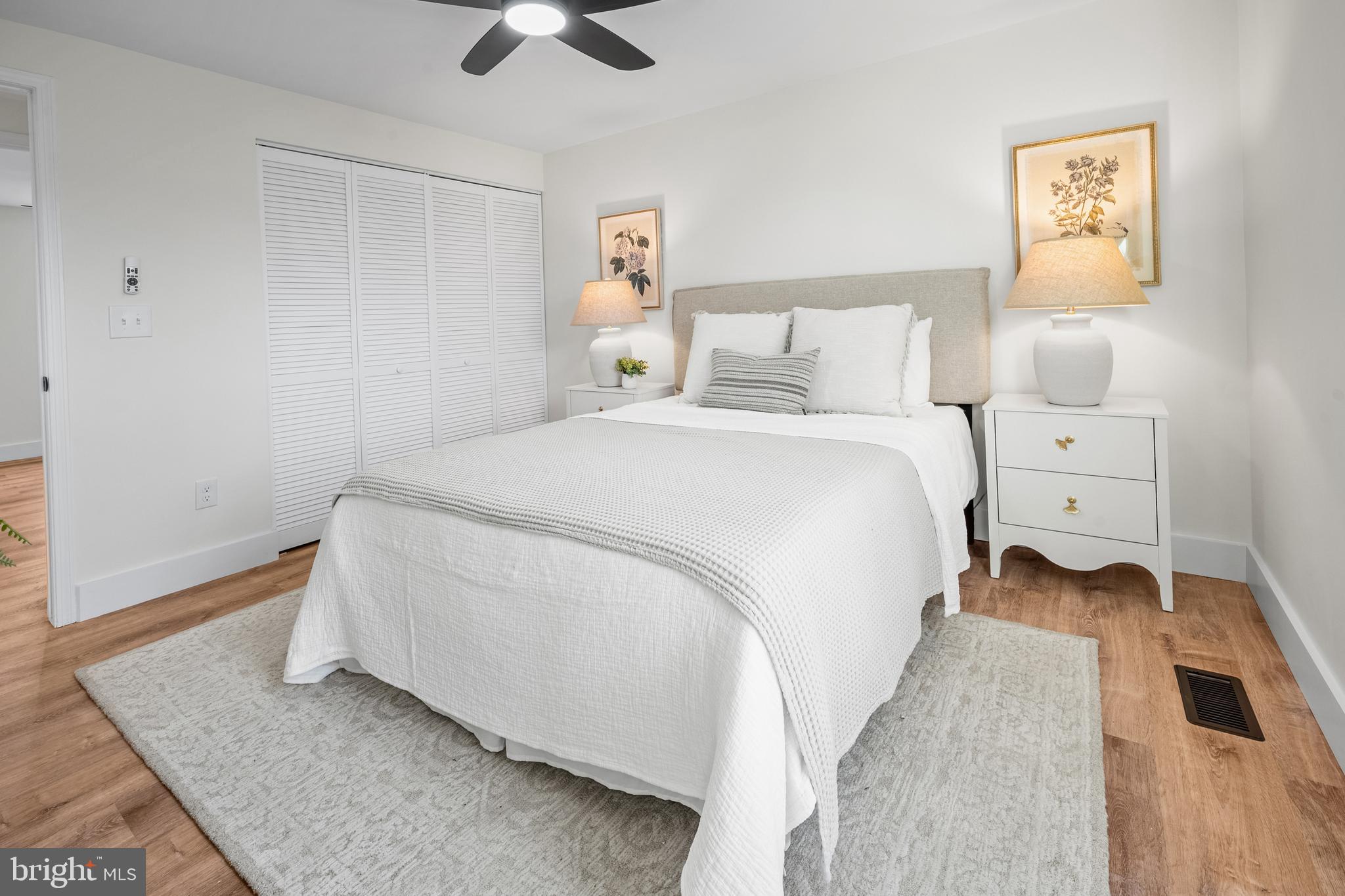 1359 Rock Chapel Road Herndon, VA 20170 - Photo 10 of 36 a bed room with a bed and a chair