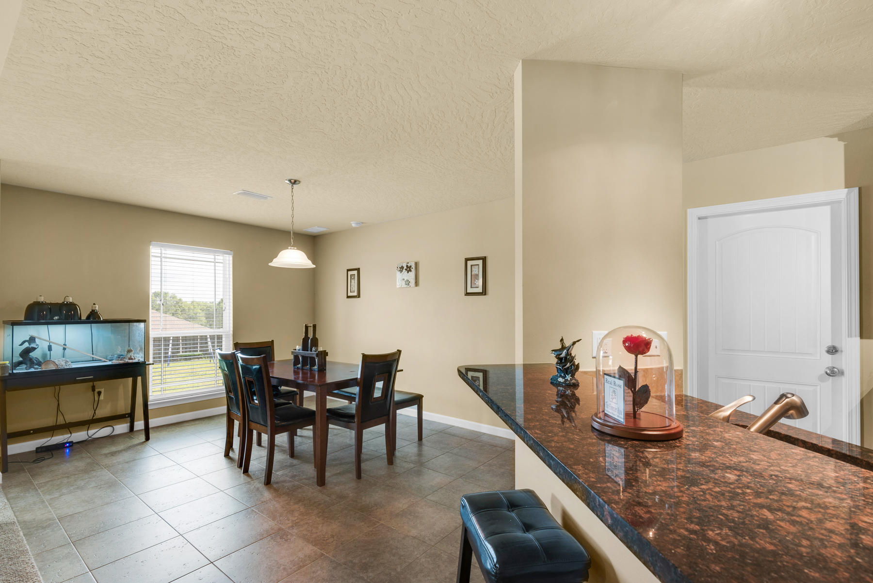 5250 Moore Loop Crestview, FL 32536 - Photo 11 of 34 a view of a dining room with furniture