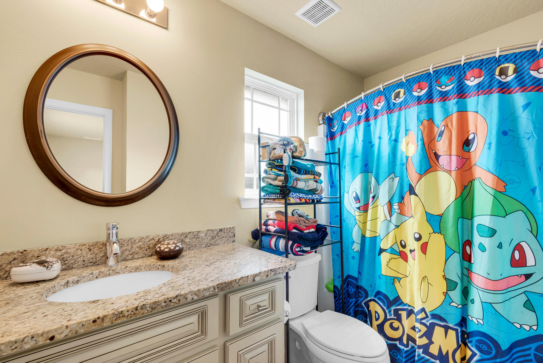 5250 Moore Loop Crestview, FL 32536 - Photo 21 of 34 a bathroom with a granite countertop sink and a mirror