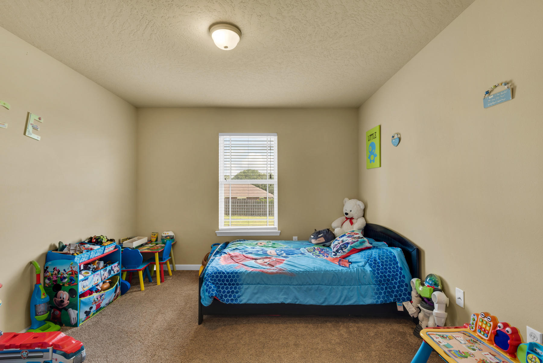 5250 Moore Loop Crestview, FL 32536 - Photo 22 of 34 a bedroom with a bed and a window