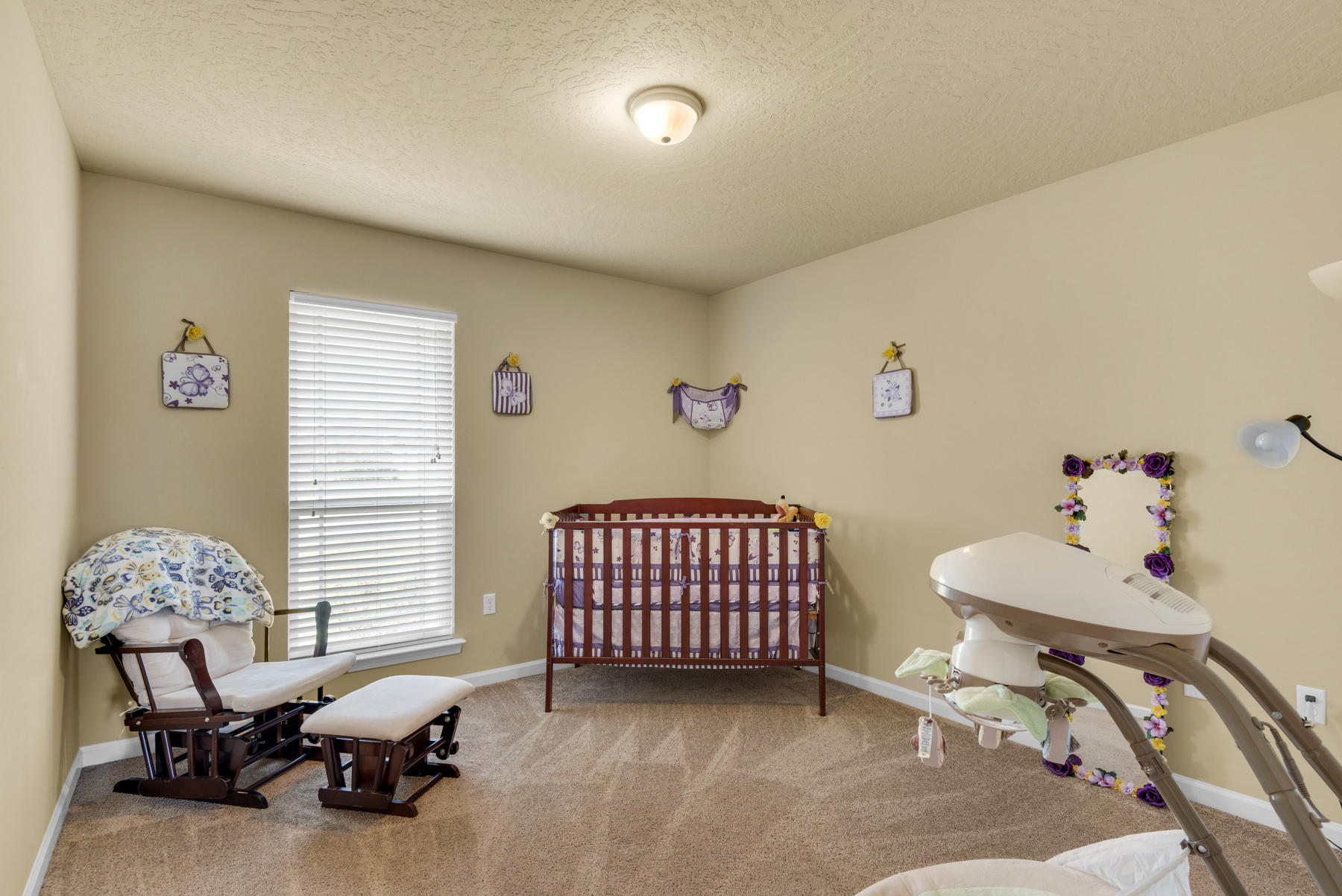 5250 Moore Loop Crestview, FL 32536 - Photo 25 of 34 a bedroom with furniture and a window