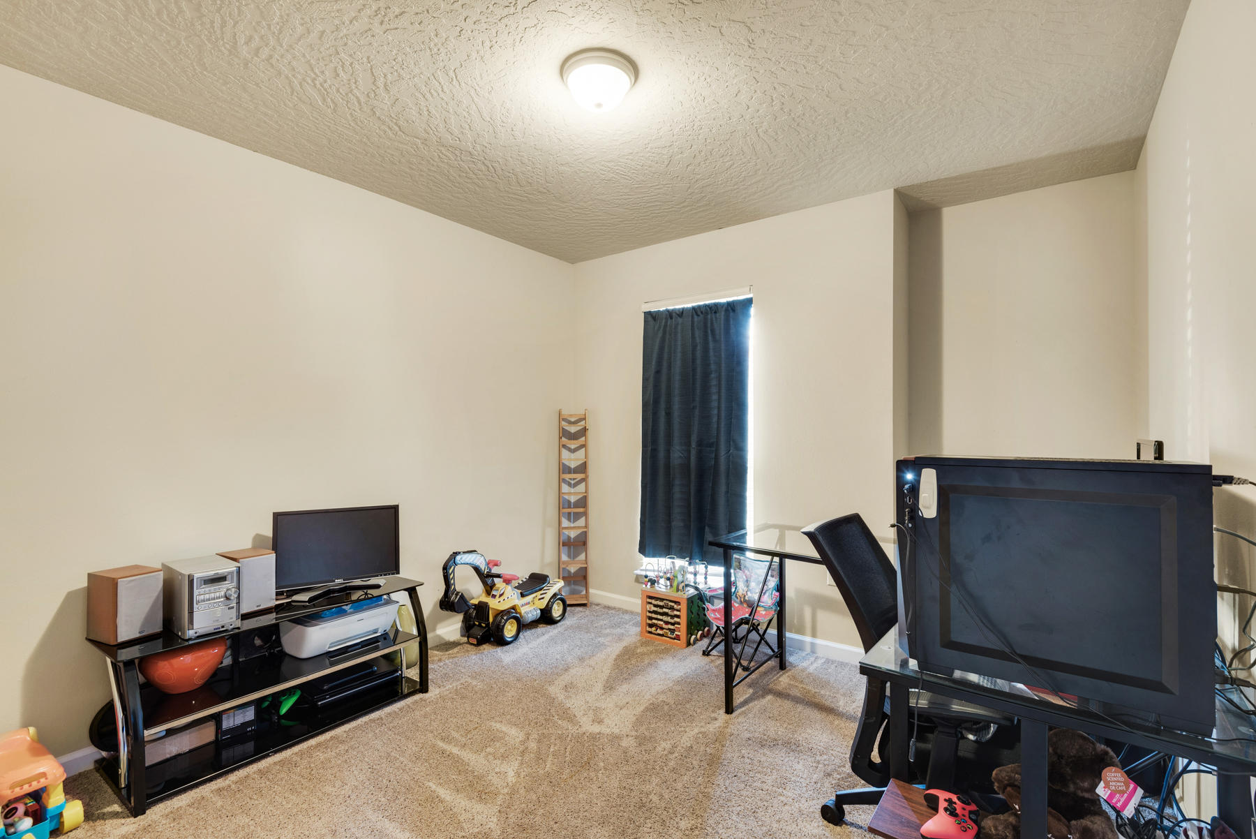 5250 Moore Loop Crestview, FL 32536 - Photo 27 of 34 a view of a workspace with furniture and a window