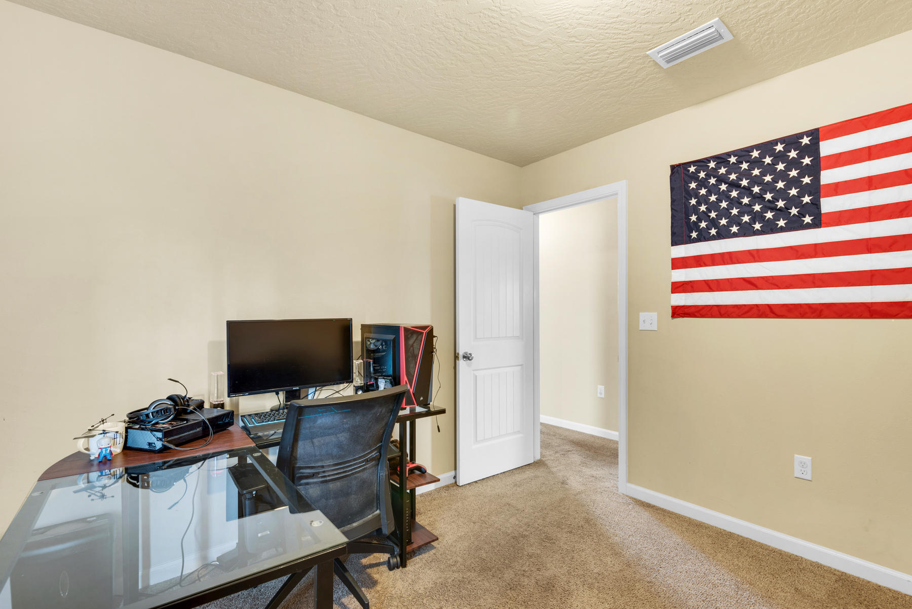 5250 Moore Loop Crestview, FL 32536 - Photo 28 of 34 a view of a workspace with furniture and a flat screen tv