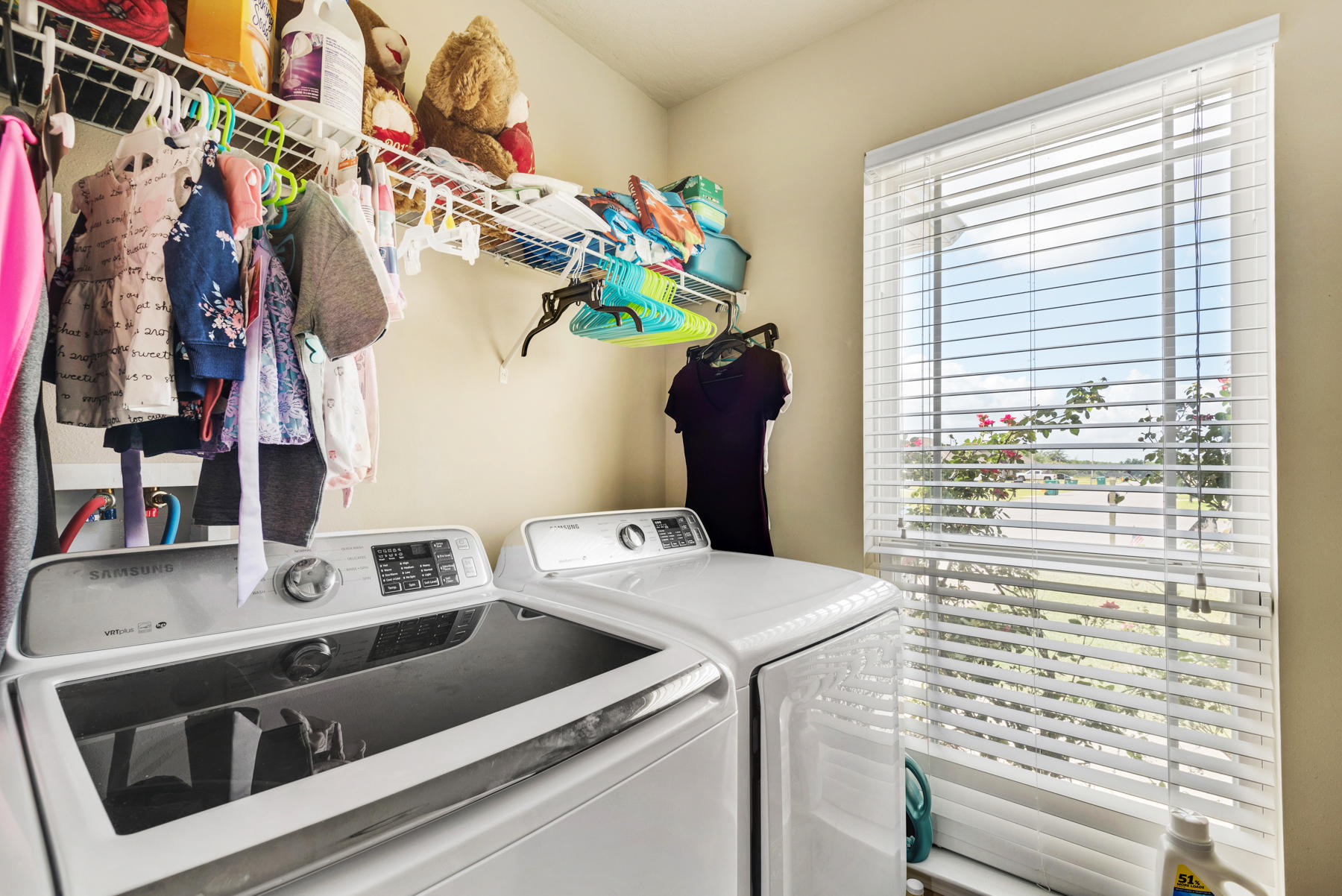 5250 Moore Loop Crestview, FL 32536 - Photo 29 of 34 a utility room with dryer and washer