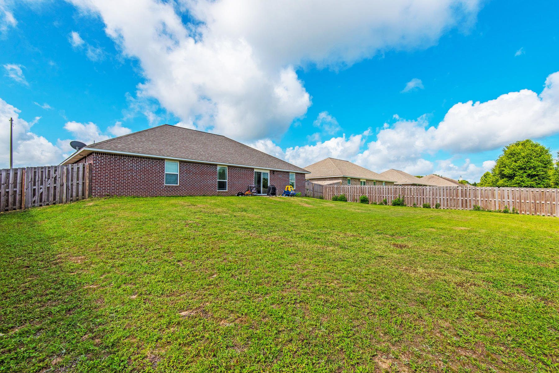 5250 Moore Loop Crestview, FL 32536 - Photo 31 of 34 a view of a house with a yard