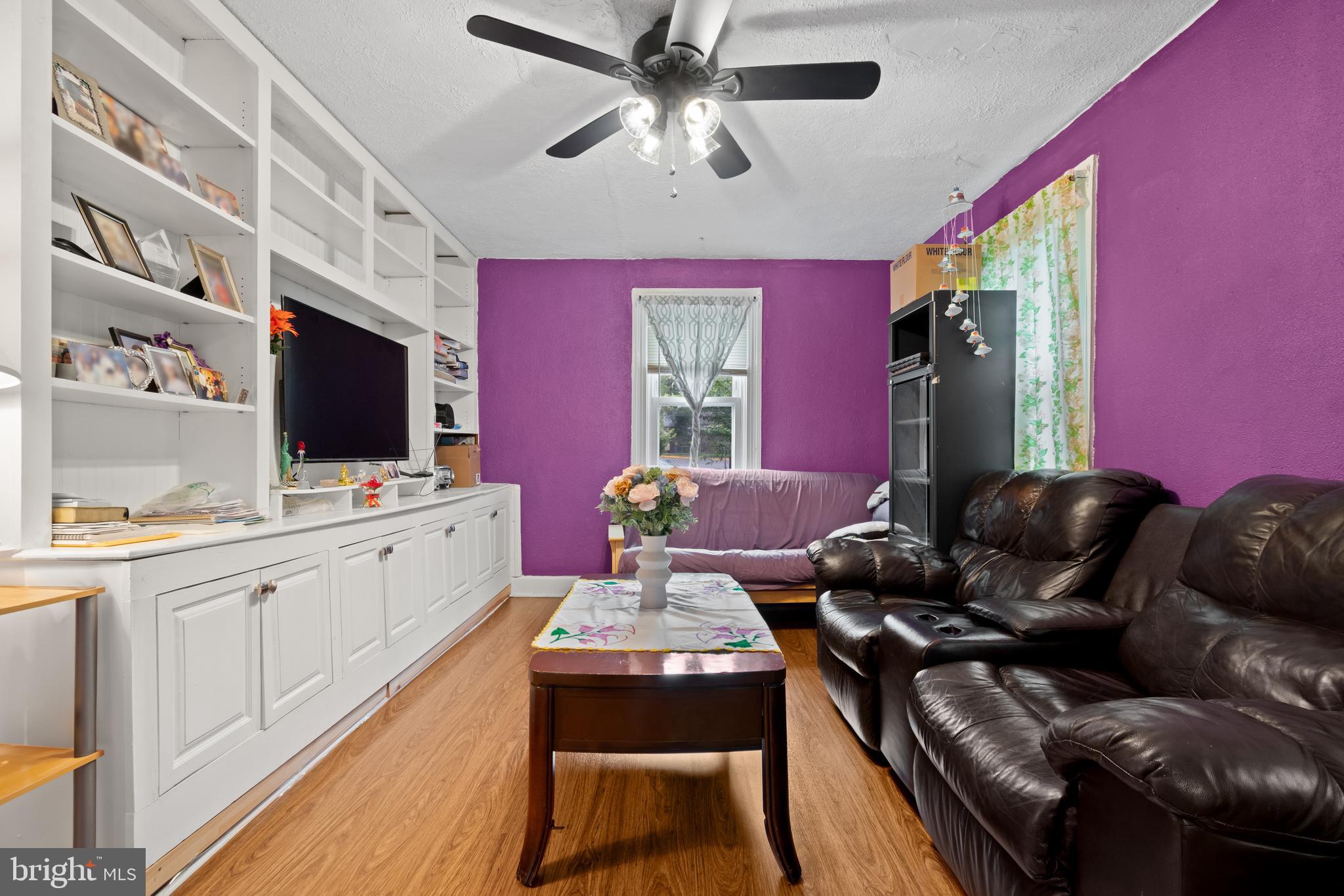 4410 Allies Road Suitland, MD 20746 - Photo 24 of 30 a living room with furniture and a flat screen tv