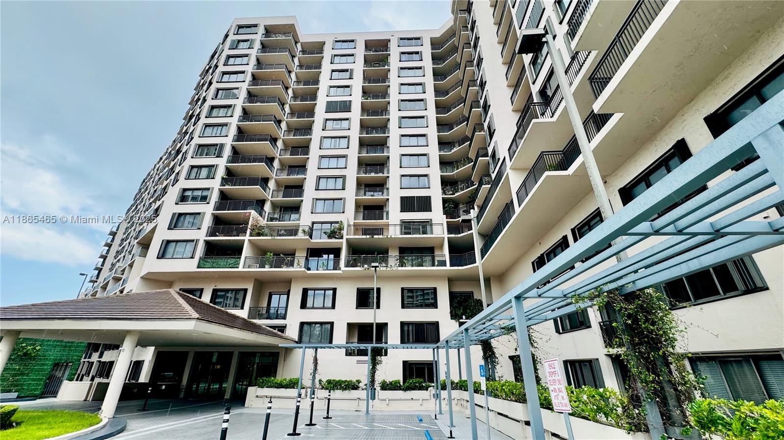 540 Brickell Key Drive, Unit 300 Miami, FL 33131 - Photo 22 of 25 a front view of a multi story building