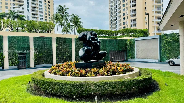 a view of a couches in a patio with swimming pool