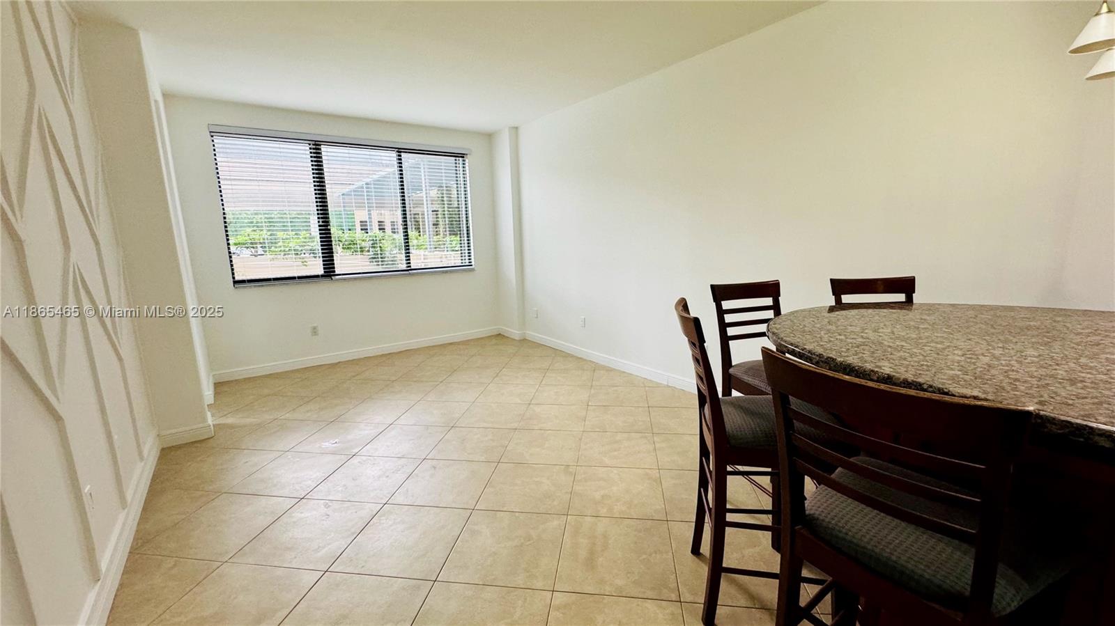 540 Brickell Key Drive, Unit 300 Miami, FL 33131 - Photo 3 of 25 a view of livingroom with furniture and window
