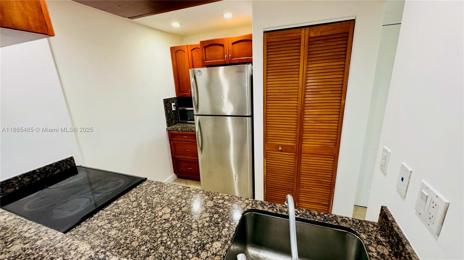 540 Brickell Key Drive, Unit 300 Miami, FL 33131 - Photo 5 of 25 a bathroom with a bathtub and shower